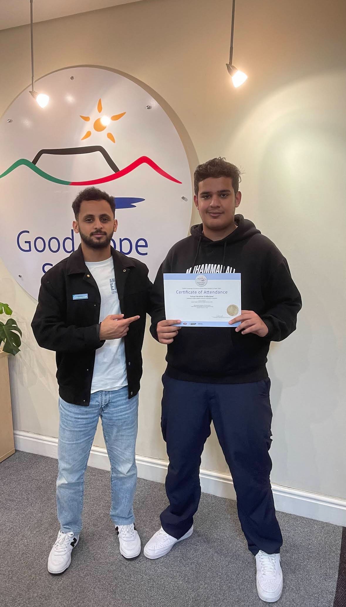 A student with his certificate