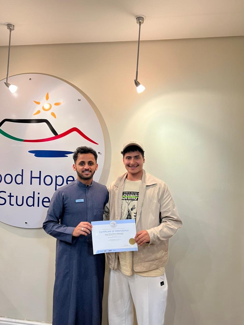 Saleh with a graduating student